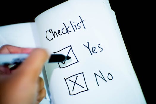 pexels-photo-416322-416322 A notebook featuring a checklist with a marked 'Yes' box, captured in a close-up shot.